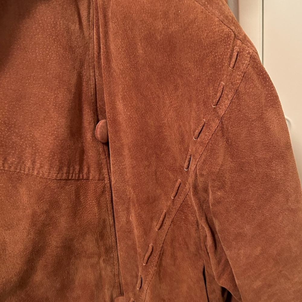 New. Never worn. Venezia leather coat